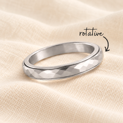 Bague Calmi argent rotative sur lin crème