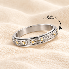 Bague floria argent rotative sur lin crème