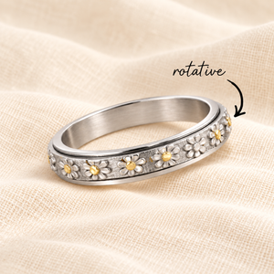 Bague floria argent rotative sur lin crème
