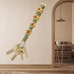 Porte-clé/bracelet fleurs taupes