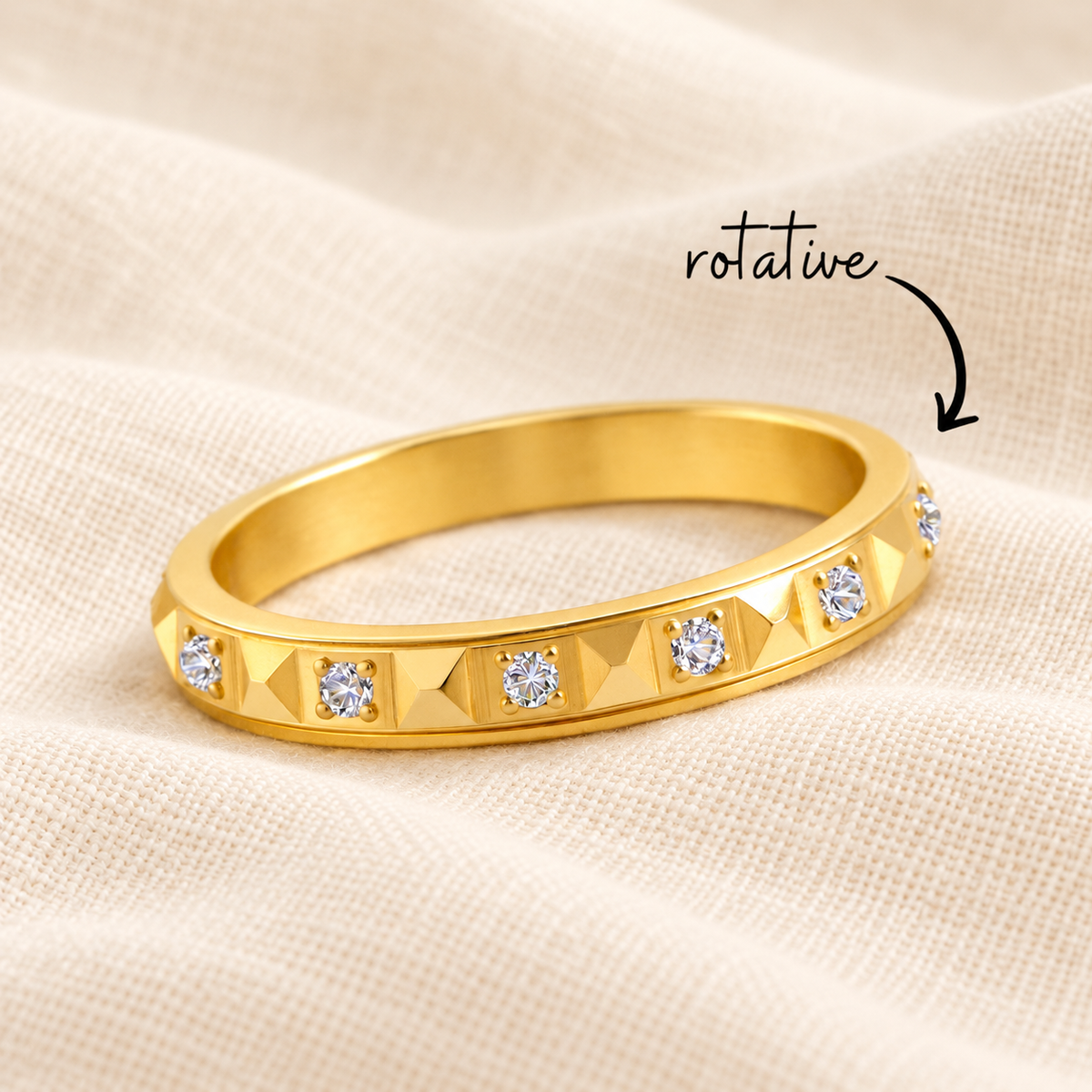 Bague hexago or rotative sur lin crème