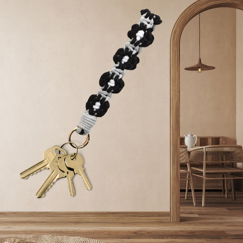 Porte-clé/bracelet fleurs noires
