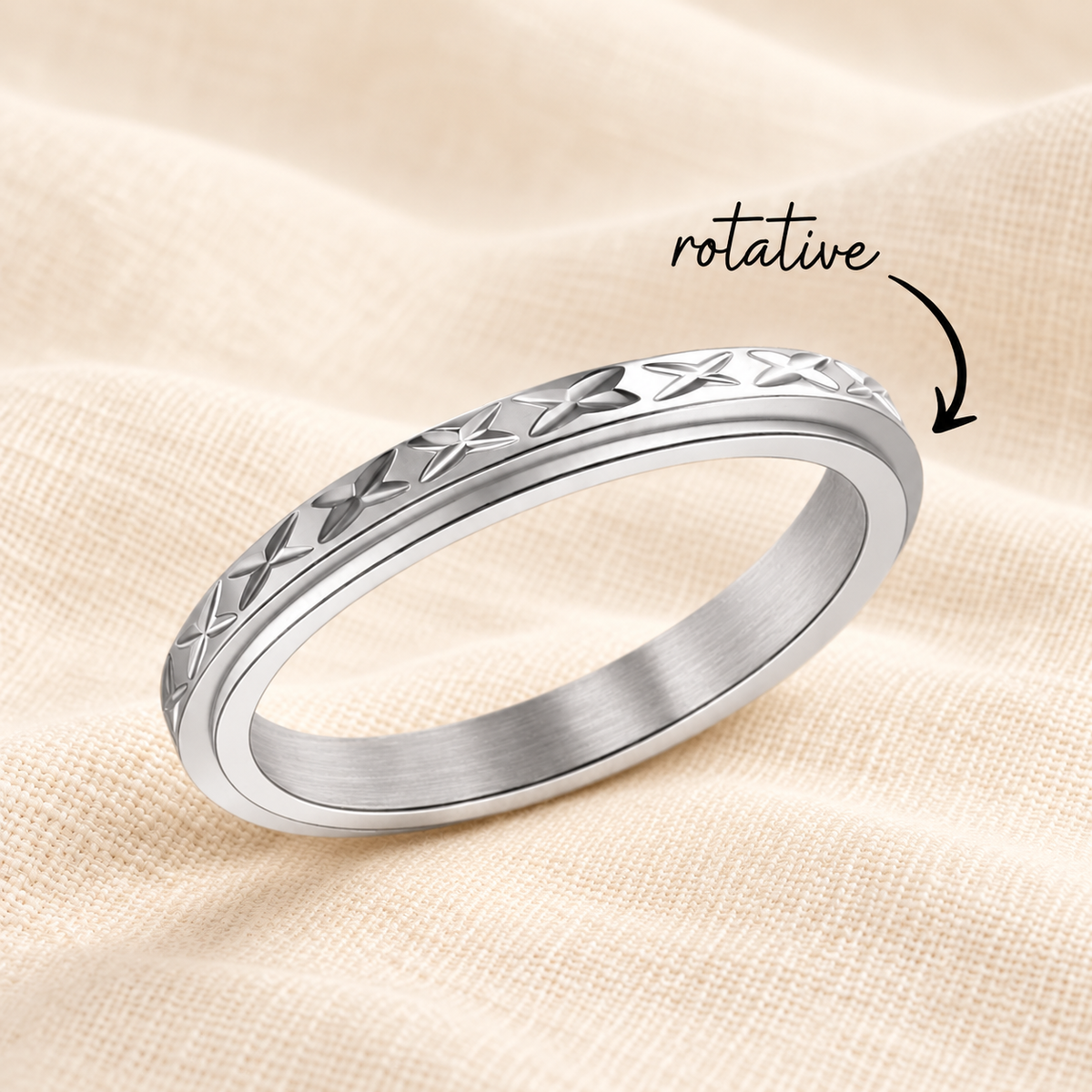Bague yaxa argent rotative sur lin crème
