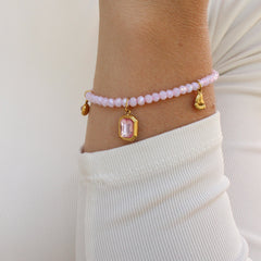 Bracelet ajustable à billes rose